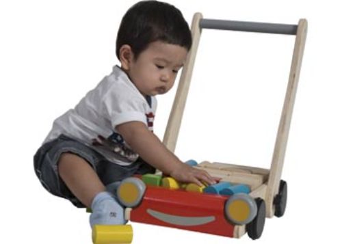 Colorful PlanToys Baby Walker with adjustable handle and natural bricks for infants, promoting walking skills and motor development.