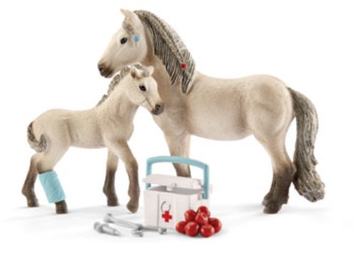 Schleich Horse Club Hannah's First-Aid Kit featuring detailed stethoscope, Icelandic mare, and foal for imaginative veterinary play.