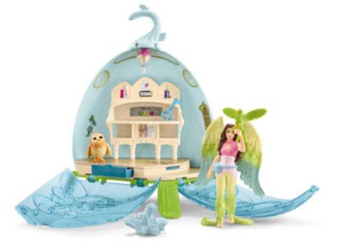 Enchanting Schleich Mystic Library Blossom toy set with fairy figure, whimsical books, and imaginative accessories.