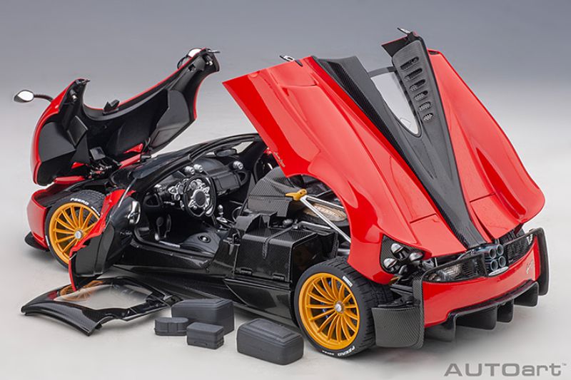 AUTOart 1/18 Pagani Huayra Roadster in Rosso Monza Red, featuring detailed exterior, interior, and opening doors.