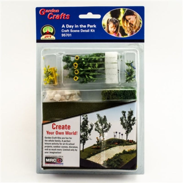 Detailed model scenery set featuring figures, greenery, and park features for realistic miniature landscapes.