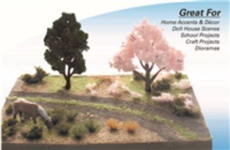 Detailed hillside scene kit featuring lush green hills, trees, and foliage for realistic model landscapes.