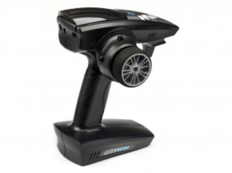 Ergonomic MTX-244 transmitter with steering wheel, triggers, and 2.4GHz tech for precision in RC car control.
