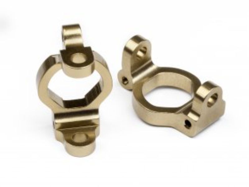 Aluminium front caster blocks for Maverick iON, enhancing durability, stability, and control with a matte amber gold finish.