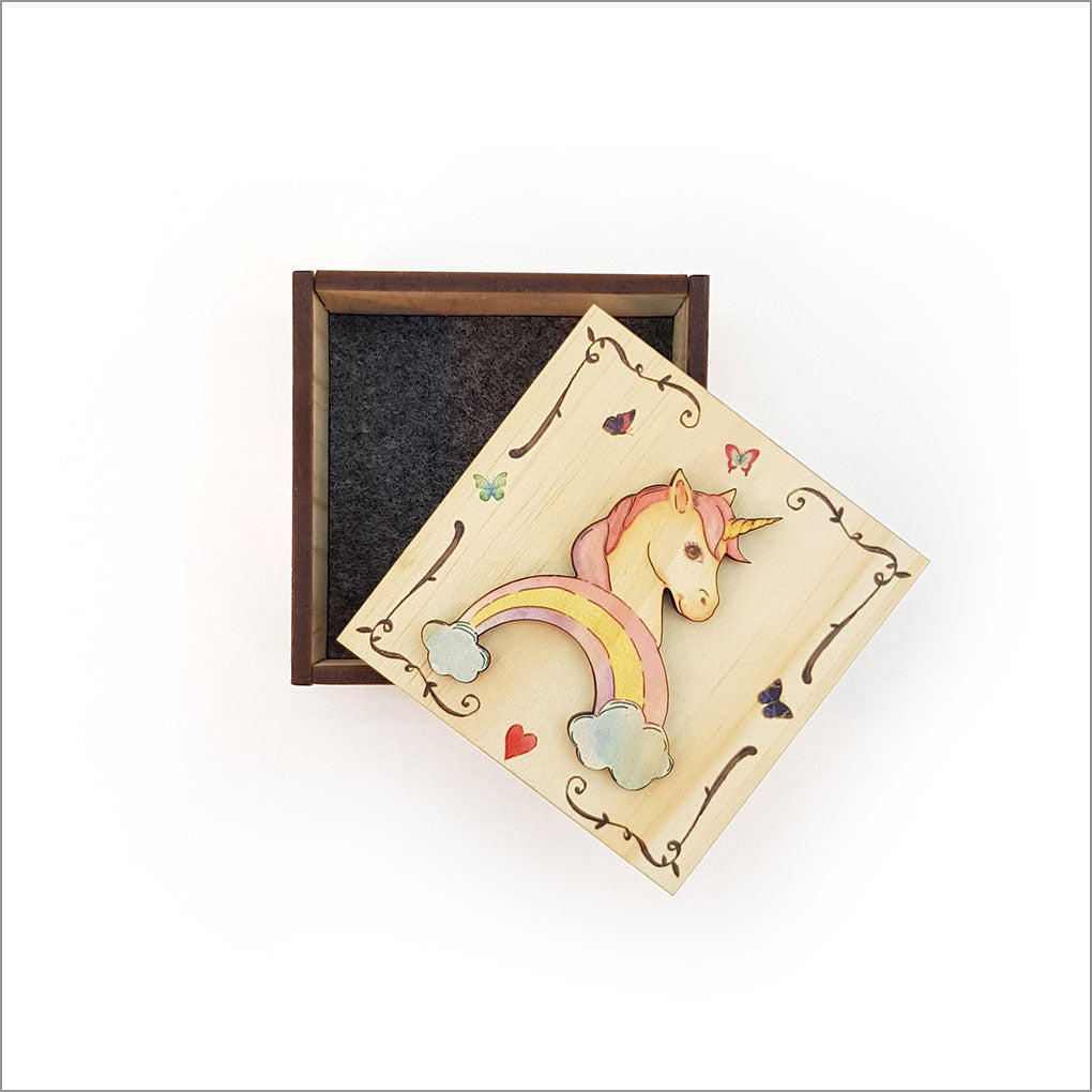 Small unicorn trinket box made of NZ Pine veneer, perfect for storing jewelry and treasures, featuring durable whimsical design.