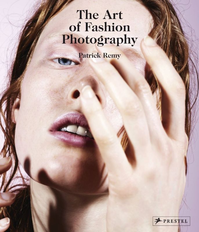Hardback book cover of "The Art of Fashion Photography" by Patrick Remy, featuring vibrant imagery and innovative styles.