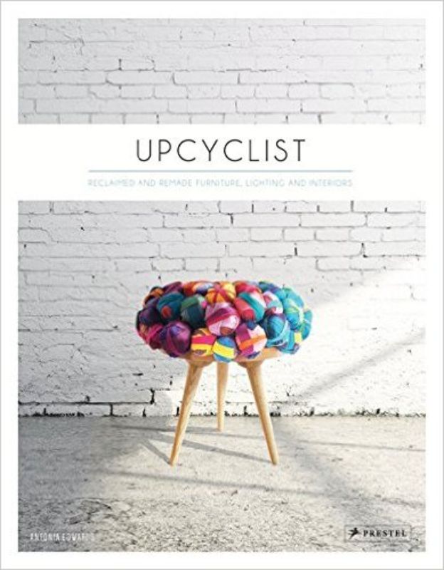 Elegant hardback book showcasing upcycled designs, featuring furniture, lighting, and art made from reclaimed materials.