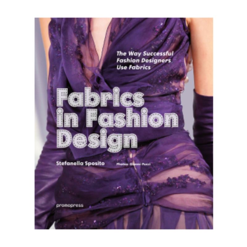 Hardcover guide "Fabrics in Fashion Design" featuring 1,600 color photos, exploring fabric types and their creative applications.