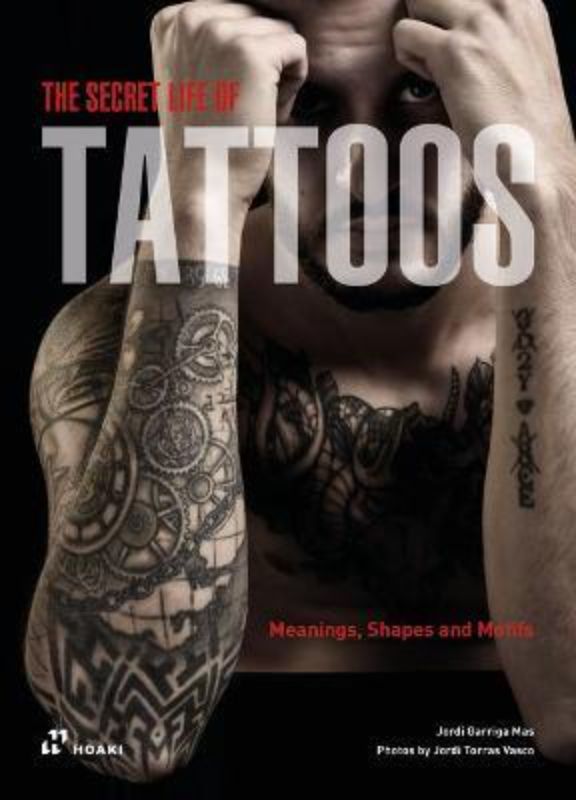 Paperback book 'The Secret Life of Tattoos' explores the meanings and history of tattoos as art and self-expression.