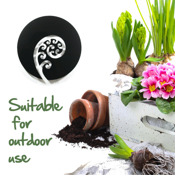 Frond Art Circle wall art, 300mm, made of durable ACM; a modern, Kiwiana-inspired decor piece for any space.