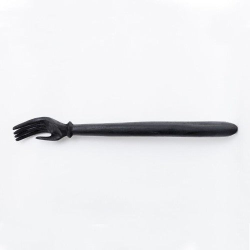Black back scratcher with ergonomic handle for easy relief from hard-to-reach itches, combining style and functionality.