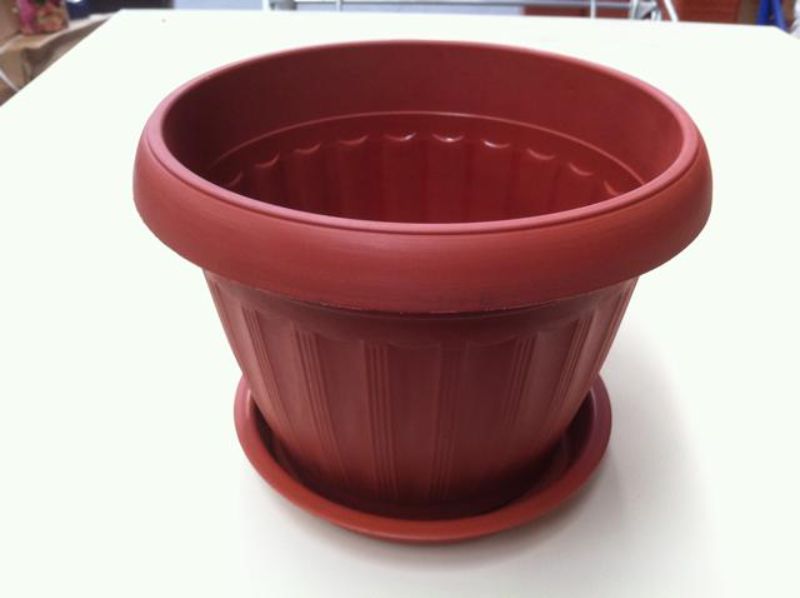 Set of 12 durable 18.5cm flower pots for indoor and outdoor use, ideal for seedlings and blooming plants.