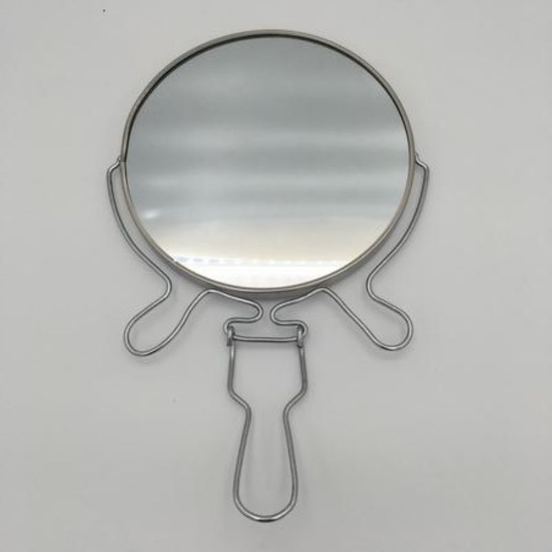 Set of 12 double-sided mirrors (7") with 1x and 2x magnification, ideal for beauty and grooming use.