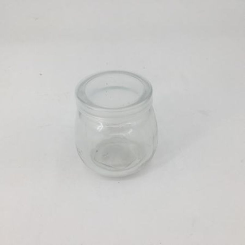 Set of 12 elegant 100ML glass bottles with lids, perfect for storing oils, sauces, and spices while enhancing kitchen decor.