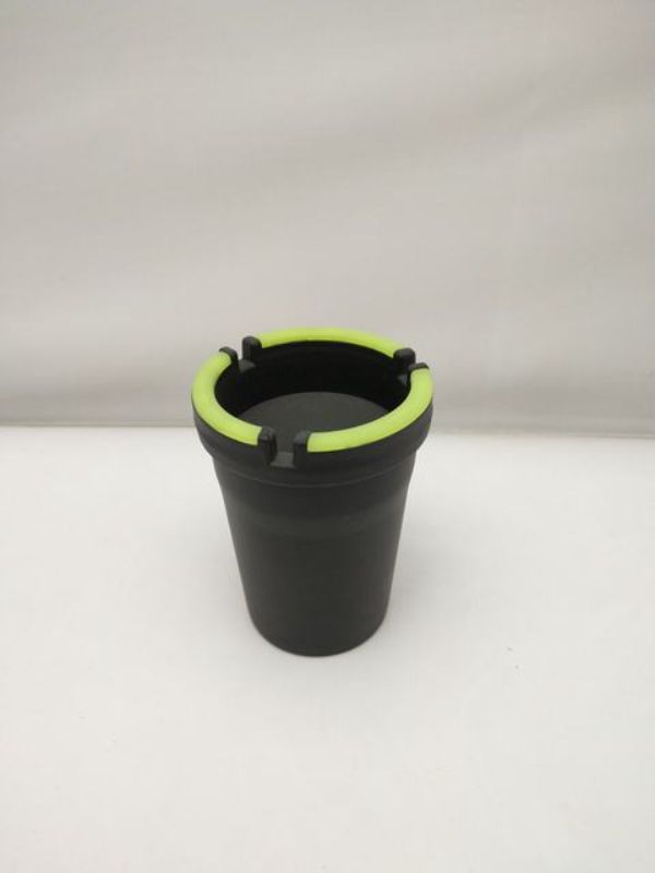 Twelve sleek black ash trays designed for style and functionality, ideal for cafes, bars, and home use.