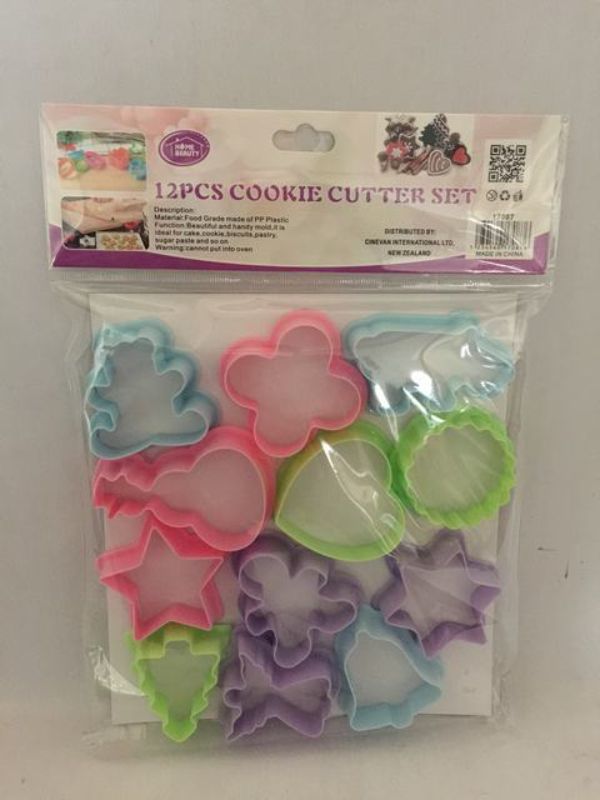 Set of 12 durable cookie cutters in assorted shapes, perfect for creative baking and fun family activities.