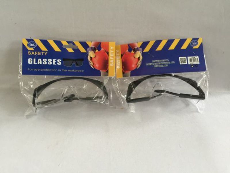 A set of 12 safety goggles with shatter-resistant lenses and adjustable straps for industrial and DIY eye protection.