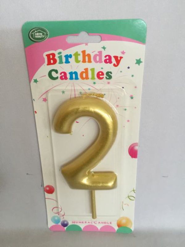 Elegant set of 12 gold birthday candles adding sparkle to any cake for festive celebrations and memorable occasions.