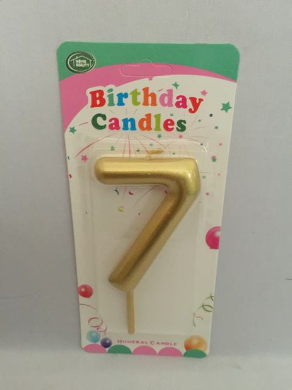 Set of 12 elegant gold birthday candles, perfect for enhancing cake decorations at celebrations and memorable events.