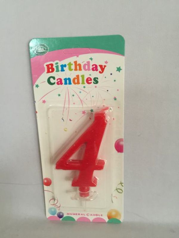 Set of 12 vibrant red birthday candles, perfect for adding joy and festivity to any cake or celebration.