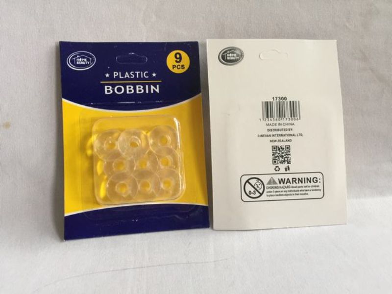 A set of 108 durable plastic bobbins for seamless sewing, ideal for quilting and crafting, keeps threads organized.