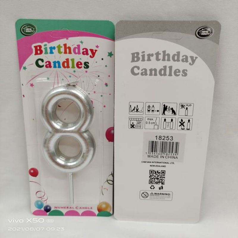 Elegant 8-inch silver birthday candles in a set of 12, perfect for enhancing cake aesthetics at any celebration.