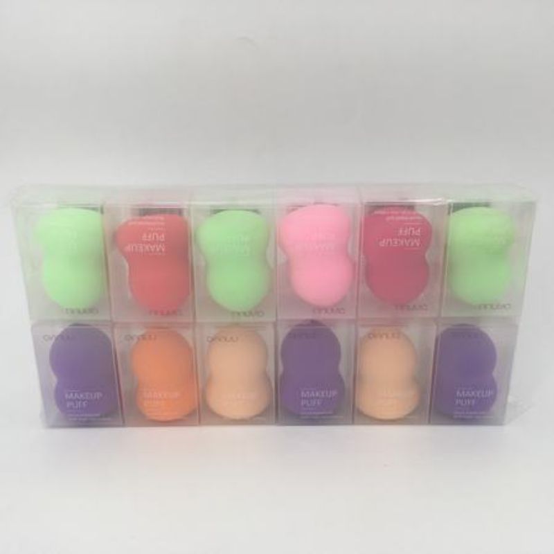 Colorful set of 12 face powder puffs for flawless makeup application, ideal for powders and foundation.