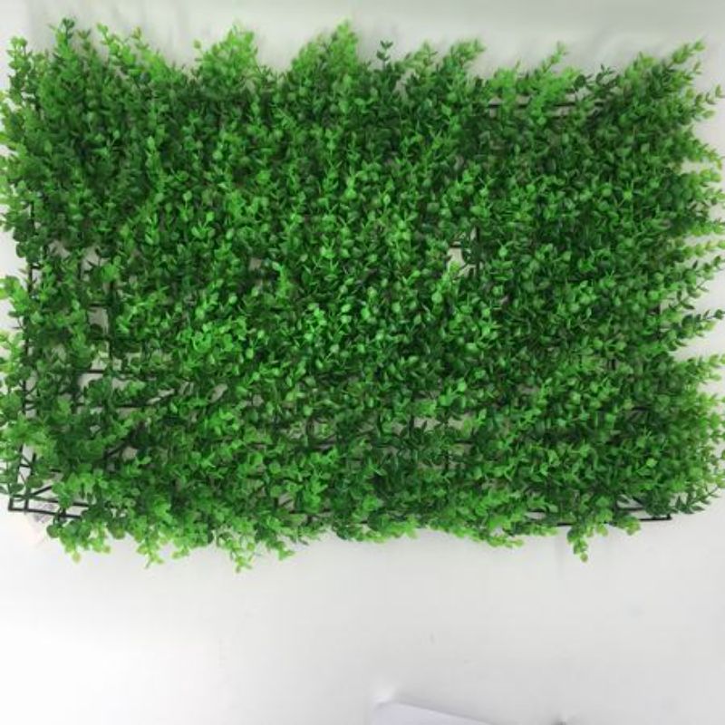 Lush green artificial lawn pieces (60cm, set of 12) for indoor/outdoor decor, easy to install with low maintenance.