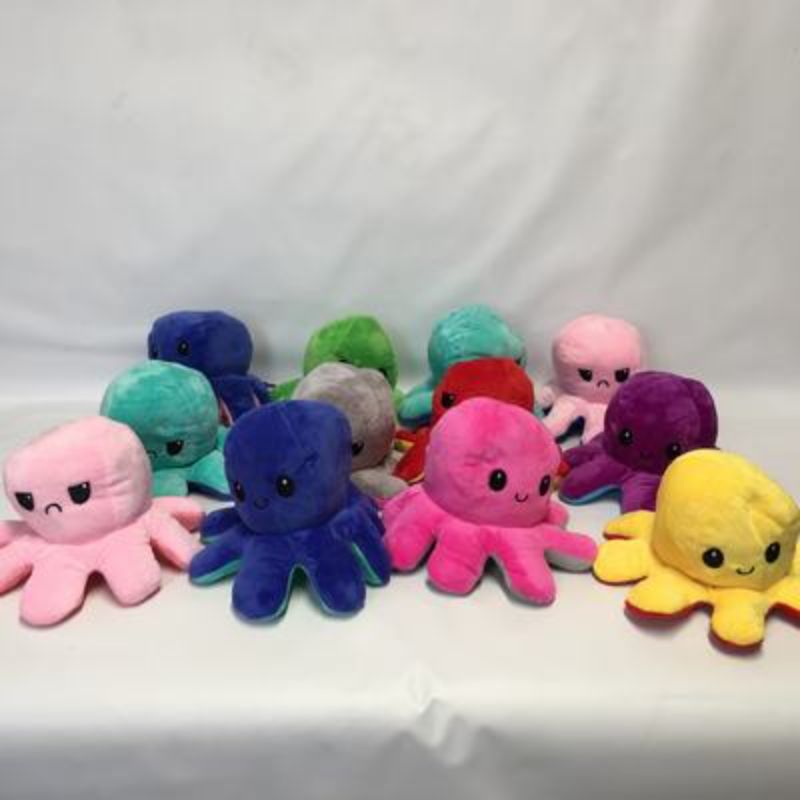 Vibrant 25cm double-sided octopus plush toy featuring happy and sleepy faces, perfect for play and cuddles.