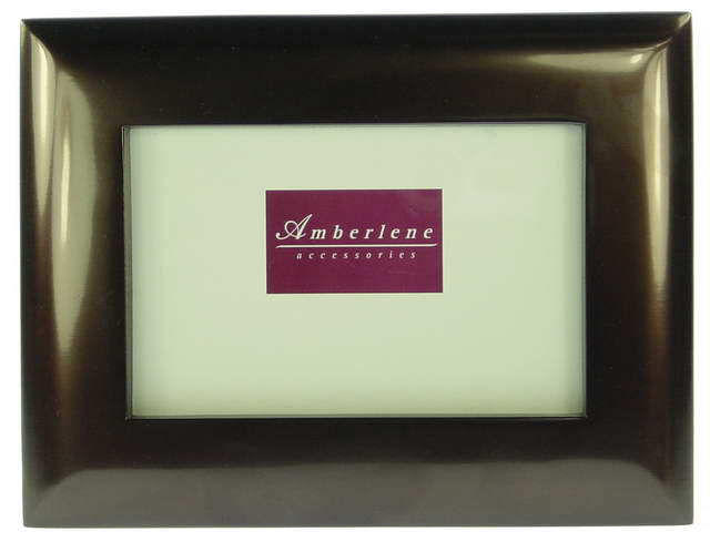 Elegant dark bronze photo frame, perfect for displaying cherished memories in any decor style.