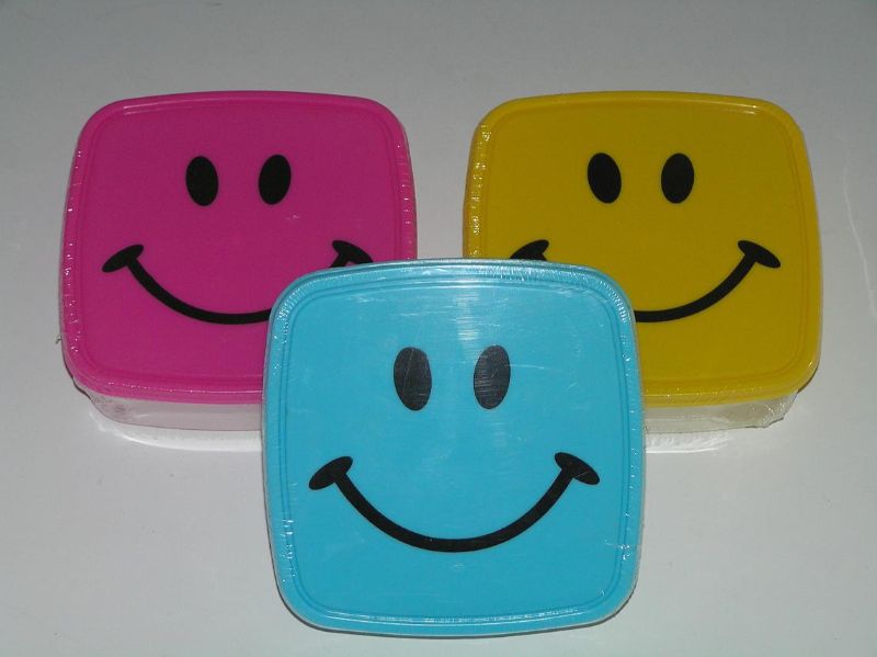 Vibrant set of 6 lunch boxes with smiley face designs, perfect for fun, eco-friendly meal prep for all ages.