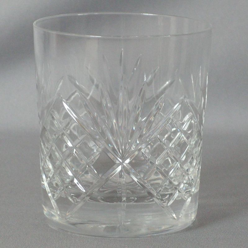 Elegant crystal glass designed for whiskey and cocktails, with stunning clarity and substantial weight for a refined drinking experience.