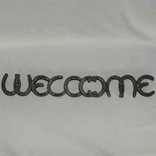 Rustic iron horse shoe welcome sign, 55cm wide, perfect for adding charm to doorways and homes.