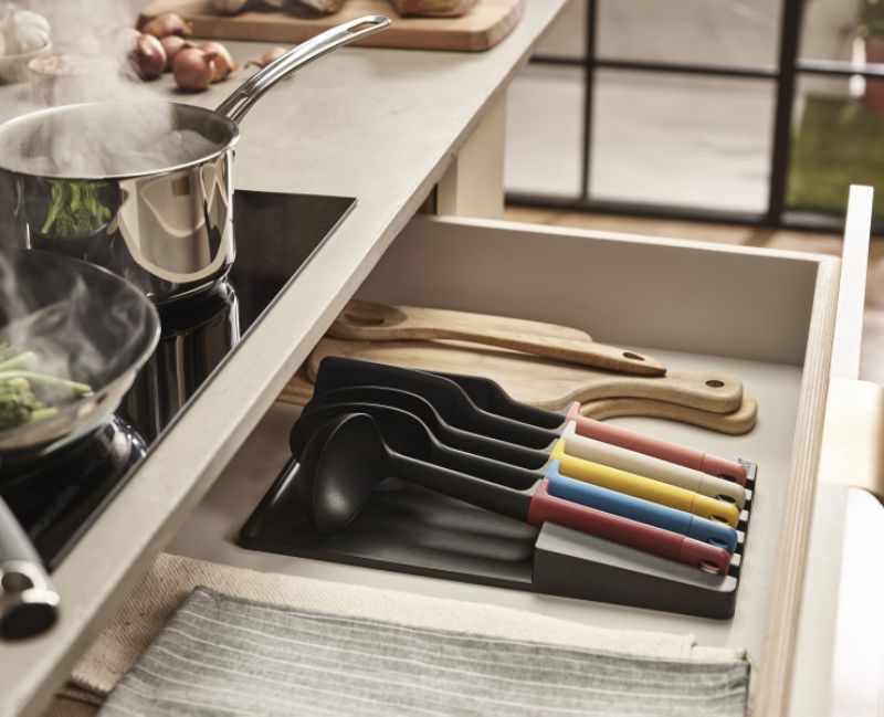 Joseph Joseph Elevate Store Utensil Set featuring weighted handles, heat-resistant heads, and organized in-drawer storage.