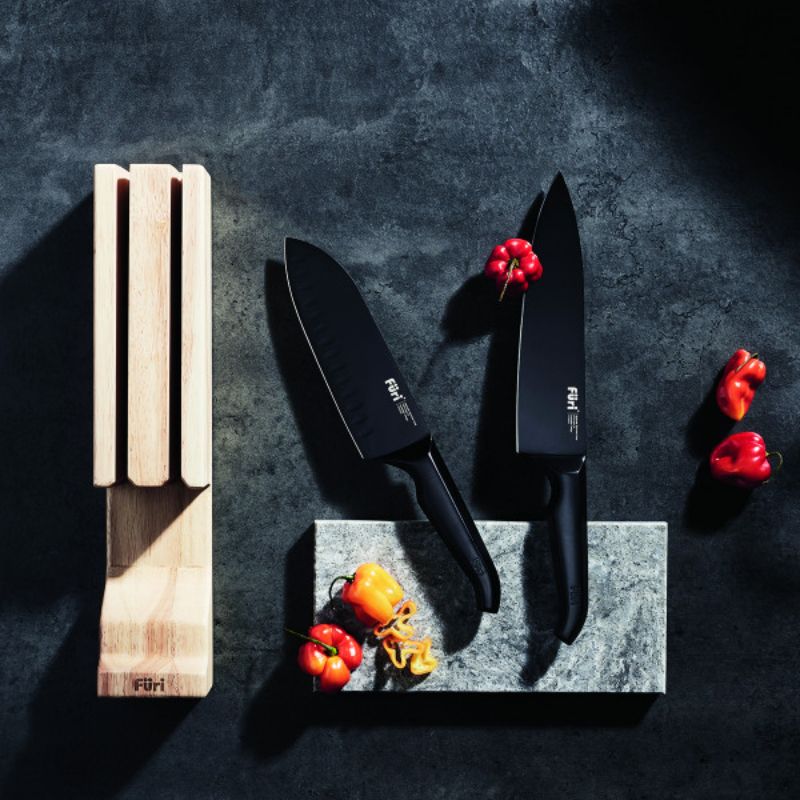 3-piece Furi Jet Black Knife Set featuring a Santoku and Cook's knife, with a stylish in-drawer block for safe storage.