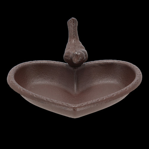Cast iron heart-shaped bird feeder and bath set, perfect for attracting various birds to your garden.