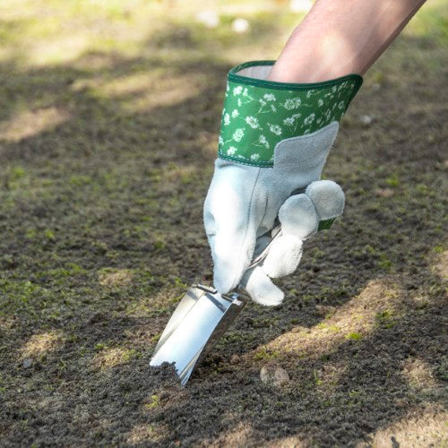 Foldable hand shovel made from stainless steel, ideal for potting plants with compact storage for gardening convenience.