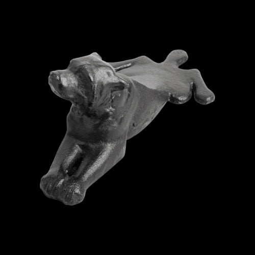 Cast iron dog door wedge, 18x7x8cm, combines style and function to securely hold doors open with a charming design.