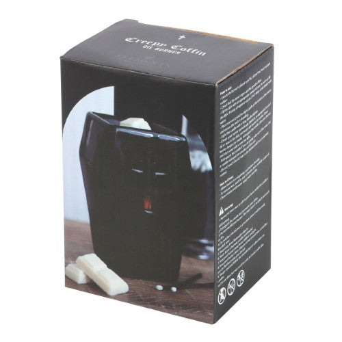 Gothic coffin-shaped oil burner with cross cutouts, perfect for creating ambiance and enhancing home fragrance.