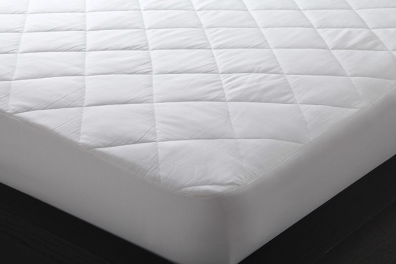 Cotton quilted mattress protector for king single bed, featuring a diamond pattern and stretchable polyester walls.