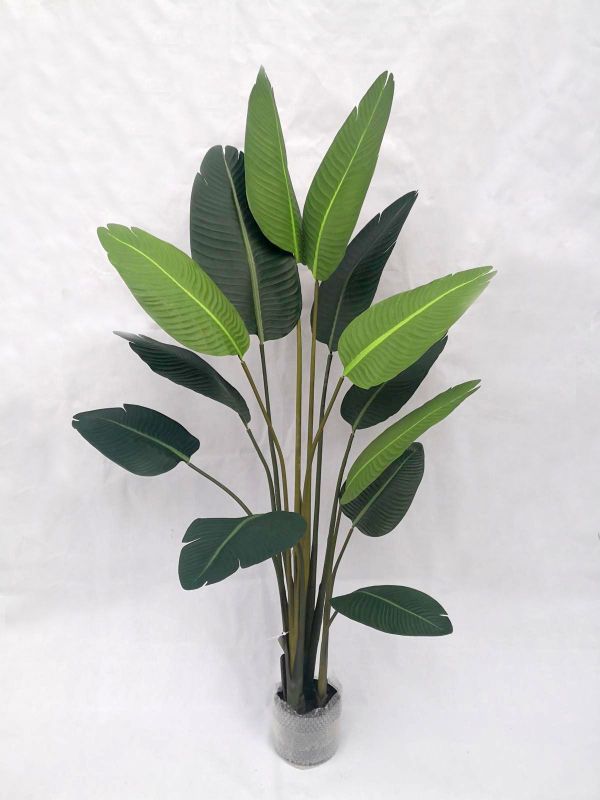 Lifelike 1.8m Artificial Bird Of Paradise Tree adding tropical elegance to any space with vibrant leaves and flowers.