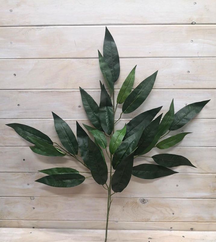 Lifelike Artificial Mango Leaf Spray in vibrant green, perfect for lush home decor and low-maintenance floral arrangements.
