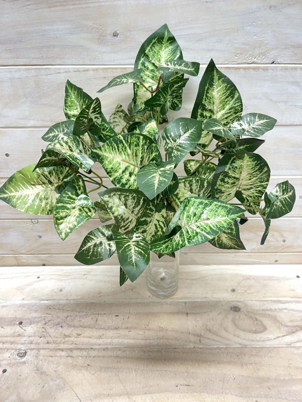 Lifelike Artificial Nephthytis Bush with realistic variegated leaves, perfect for effortless indoor decor and calming ambiance.