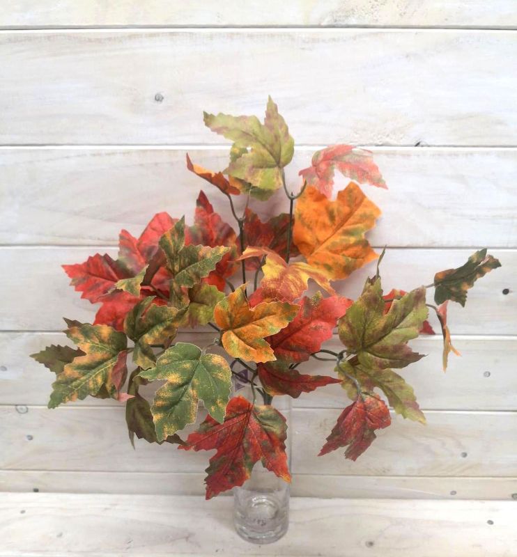 Lifelike Artificial Maple Leaf Bush with vibrant autumn colors, perfect for stylish home decor and low-maintenance arrangements.