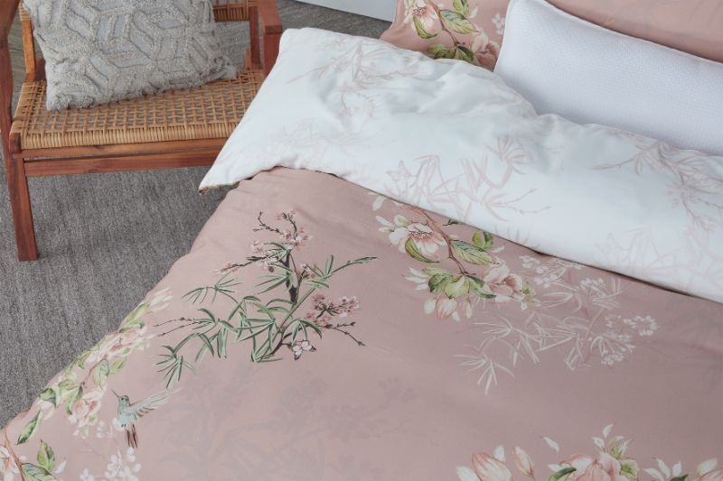 Elegant King Duvet Cover Set KB in soft blush with floral design, featuring self-flange and white piping for a serene bedroom aesthetic.
