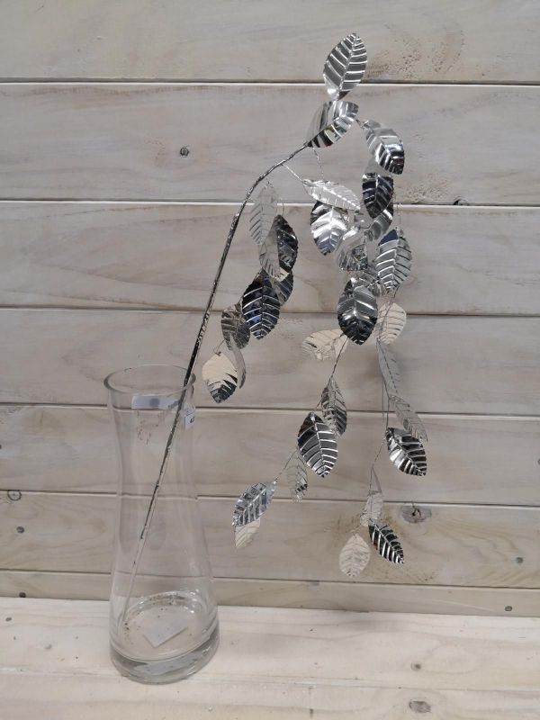 Elegant silver hanging leaf spray, perfect for enhancing home decor with a touch of sophistication and nature's beauty.