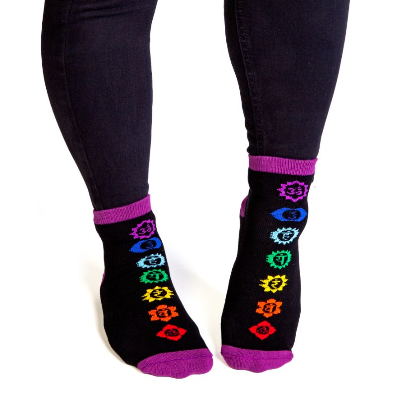 Vibrant 20cm socks featuring chakra symbols and anti-slip 'CHAKRAS ALIGNED' words for style and spiritual expression.
