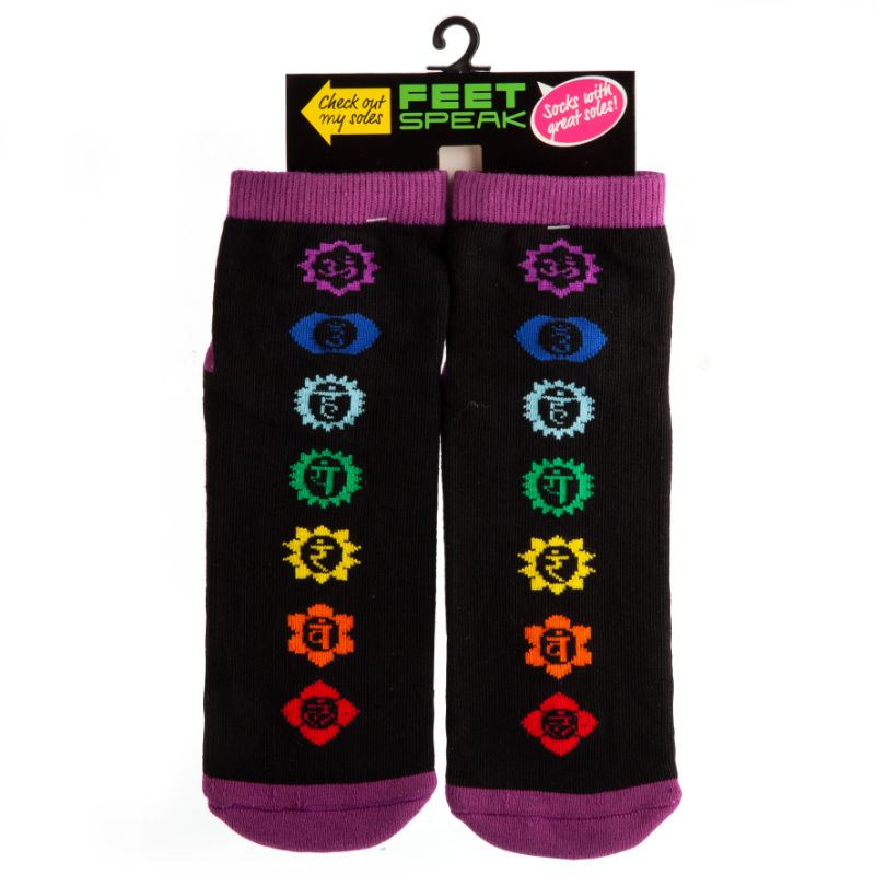 Vibrant Chakra Feet Speak socks featuring rainbow chakra symbols and anti-slip 'CHAKRAS ALIGNED' text on the bottom.
