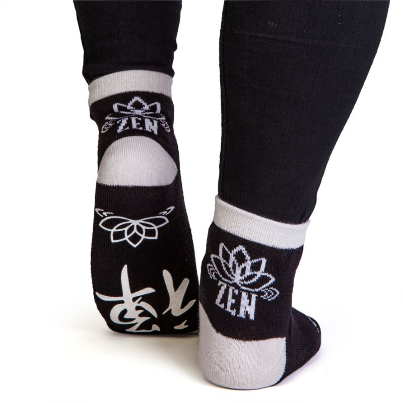 Black Zen Feet Speak socks with a grey meditating silhouette and anti-slip print for comfort and mindfulness.