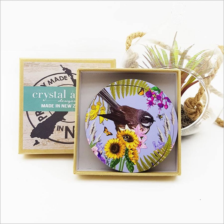 Vibrant floral coasters featuring New Zealand birds, crafted on durable MDF with a cork base for protection and grip.